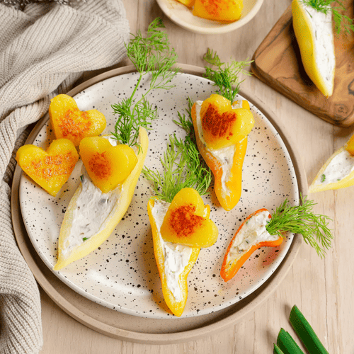 Gefüllte Paprika mit Würz-Frischkäse und Herzelinos® – Herzhaft & aromatisch genießen!